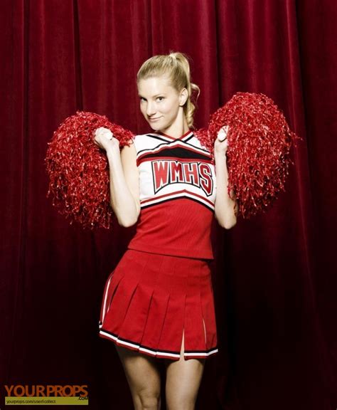 The tags on both the top, skirt, and sneakers have the name Brittany written on them. . Glee cheerios uniform